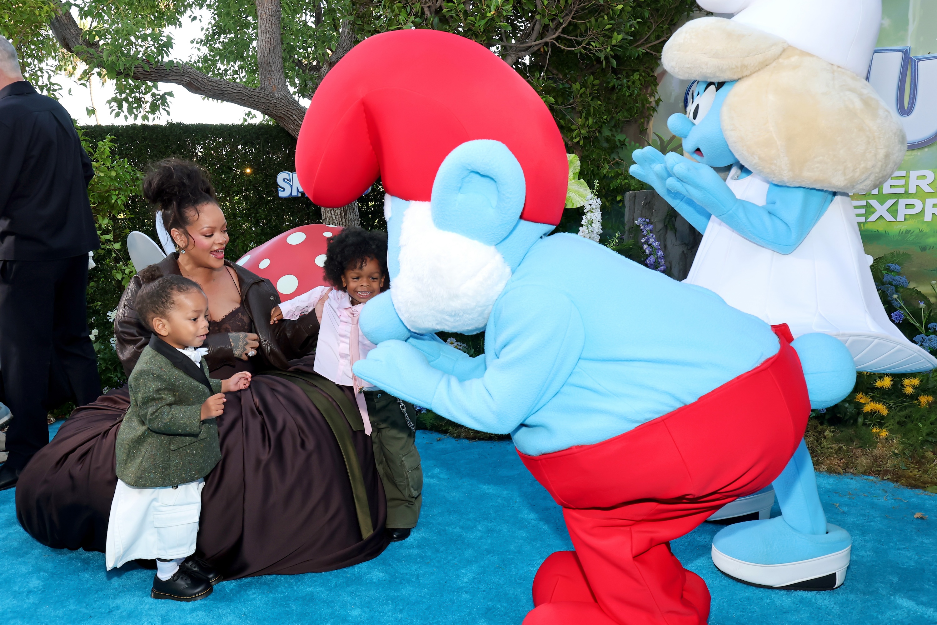 Pregnant Rihanna Beams Holding Hands With Her 2 Sons at 'Smurfs' Premiere